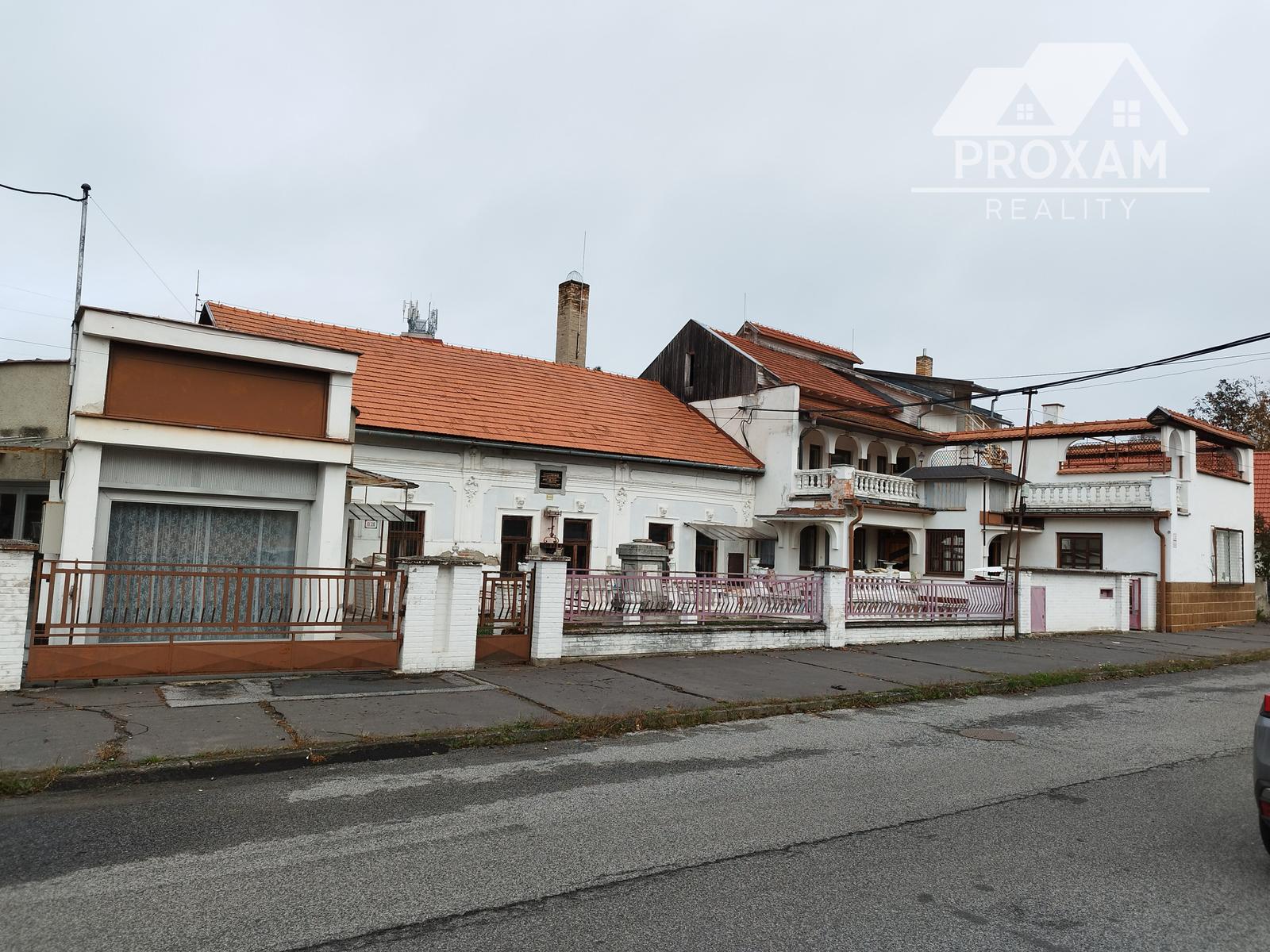 Znížená cena. Predaj rodinného domu a komplex budov v Lučenci časť Opatová