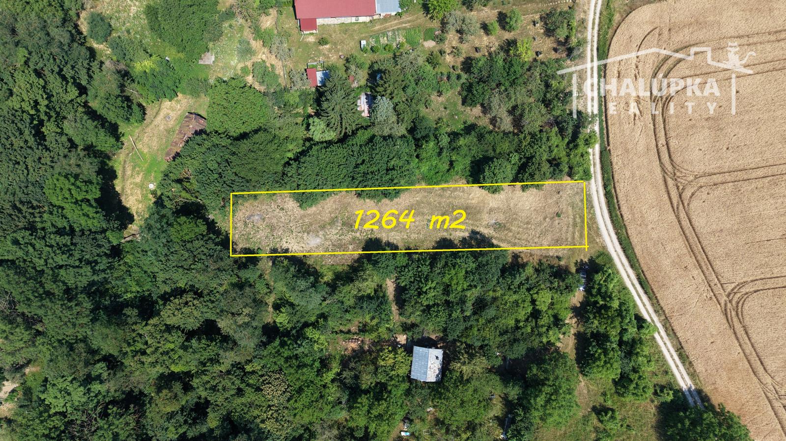 Pozemok na výstavbu RD, 1264 m2 v Haluziciach pri Novom Meste nad Váhom – fotka 2