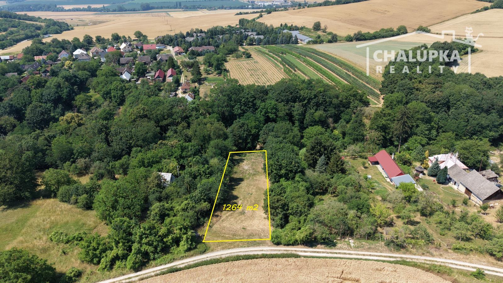 Pozemok na výstavbu RD, 1264 m2 v Haluziciach pri Novom Meste nad Váhom